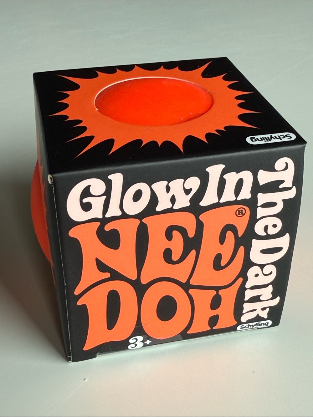 Needoh glow in the dark. Brand new. Orange.